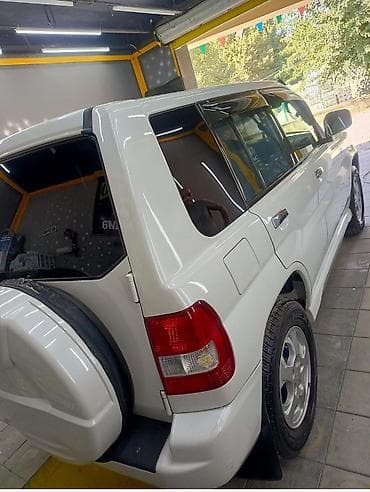 renault megane motoru: Mitsubishi Pajero iO (GDI) – 5 qapılı kompakt off-road SUV. il:2000 — 4