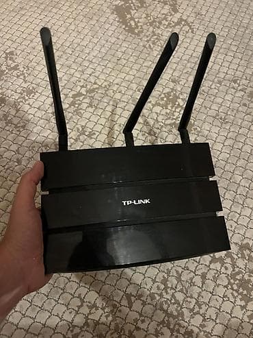 modem satilir: TP-Link TD-W8980 N600 Wireless Dual Band Gigabit ADSL2+ Modem Router — 1