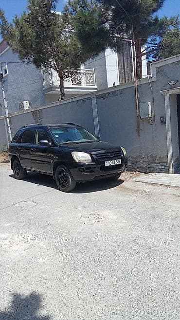 kia k3: Kia Sportage: 2 l | 2006 il Ofrouder/SUV — 1
