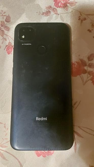 Redmi smartfon Xüsusiyyətlər: - Arxa paneldə barmaq izi skaneri - “AI