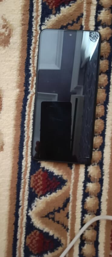 vivo iqoo 13 qiymeti: Xiaomi 13T, 256 GB, rəng - Qara, 
 Barmaq izi, İki sim kartlı, Düyməli — 1