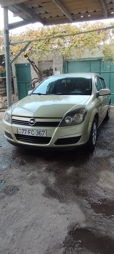 masin cip: Opel Astra H hatchback - Kuzov: 5 qapılı hatchback, açıq yaşıl rəng - — 2