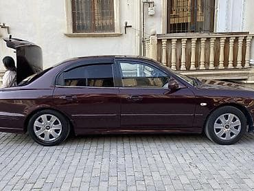 opel vectra c: Hyundai Sonata: 2.4 l | 2003 il Sedan — 7