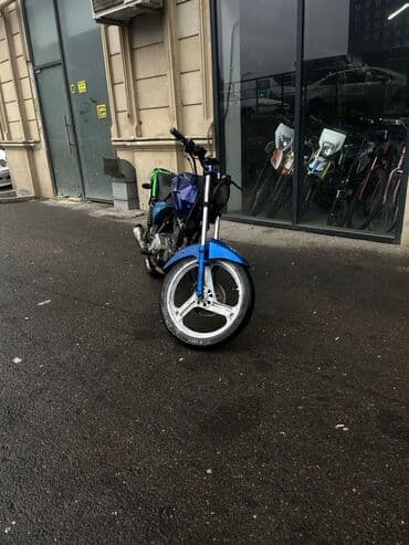 mühərrik: Motosiklet – şəhər içi və qısa məsafələr üçün yığılmış, yüngül — 1