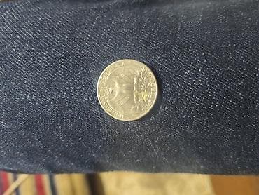 ABŞ çeyrək dollar (quarter) sikkəsi Xüsusiyyətlər: - Nominal: 25 sent — 1