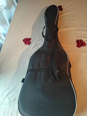 ox ve yay satisi: Məhsul: Klassik akustik gitara + yumşaq çanta Təsvir: - 6 simli — 3