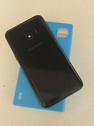 redmi 8 kabrolari: Samsung Galaxy J2 Core, 16 GB, rəng - Qara, İki sim kartlı — 2