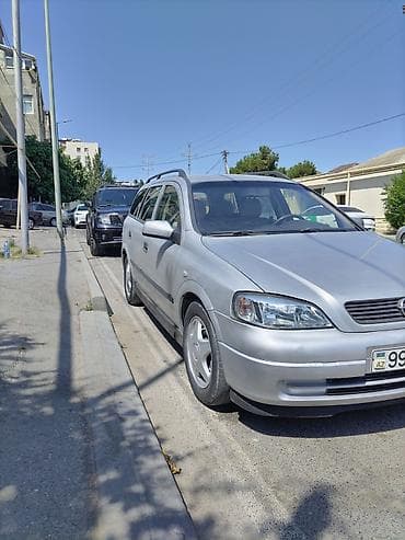 Nəqliyyat: Opel Astra: 1.8 l | 1999 il 554000 km Universal — 3