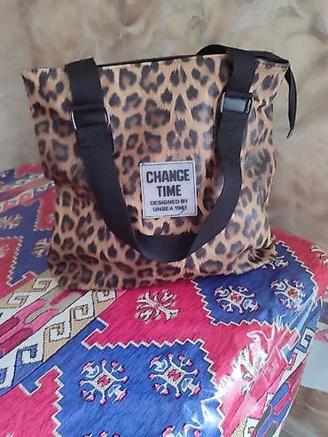 gucci sumkalar: Boyuk geni canta.Leopar naxışlı tote çanta. - Brend yazısı ön — 1