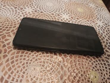 телефон fly ezzy 2: Smartfon – qara rəng - Ekran: ön tərəfdə damla tipli (waterdrop) ön — 2