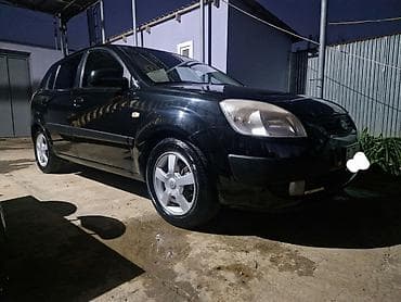 changan star 2: Kia Rio hatchback – qara rəngli, 5 qapılı şəhər avtomobili. Texniki — 2