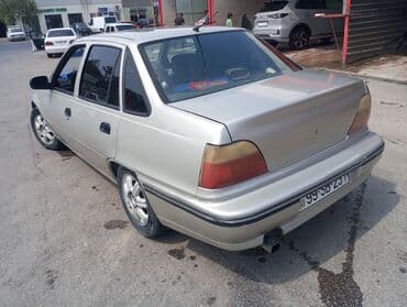 купить чехлы на авто: Model: Daewoo Nexia sedan Kuzov: 4 qapılı, gümüşü rəng — 3