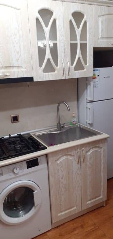 tam temirli menziller: İnşaatçılar metrosunun çıxısında inşaat binasında 12 mertebeli — 6