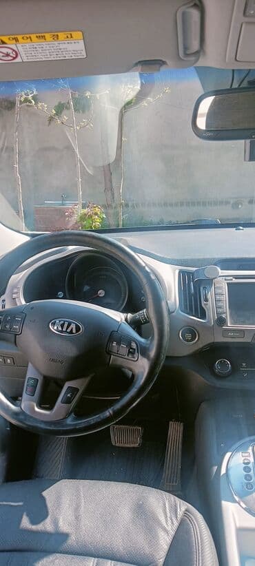 mercedesbenz 190 w201: Kia Sportage: 2 l | 2015 il Krossover — 3