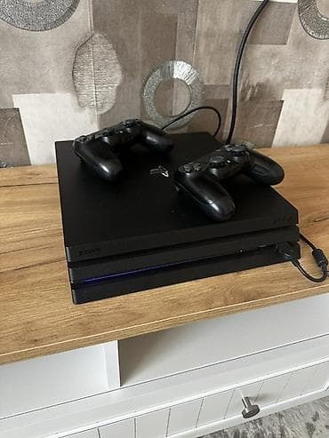 xbox one disk: PlayStation 4 Pro - Daxildir: - 2 ədəd DualShock 4 simsiz idarəetmə — 2