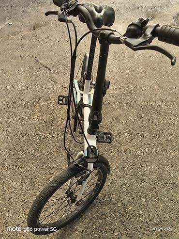volta: BTWIN firma alüminium qatlanan velosiped. Portuqaliya istehsalıdır. 20 — 5
