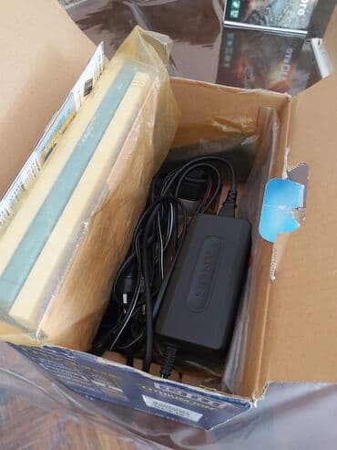 canon eos 4000d qiymeti: SUM yaninda — 4