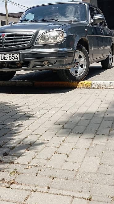 qaz 63: GAZ-31105 Volga sedan - Kuzov: 4 qapılı sedan, tünd boz (metallic) — 3