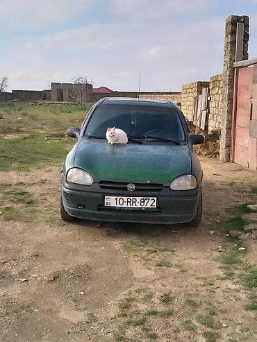 opel karopka: Opel Corsa B, yaşıl rəng, hetçbek gövdə. Texniki xüsusiyyətlər: - — 2