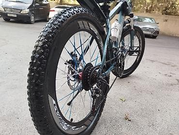 velosiped ural: Dağ velosipedi – 24” təkərlər, enli protektorlu şinlər. Rəng: tünd — 3
