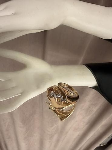 qızıl zinət əşyaları: 10 qr 750 prob üzük. 2000 AZN — 3