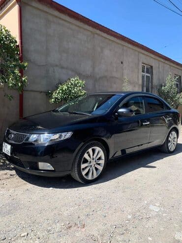 mersedes c 230: Kia Cerato: 1.6 l | 2011 il Sedan — 2