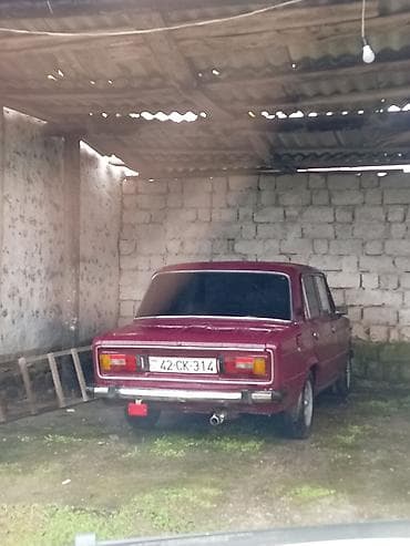 samara maşın: VAZ 2106, al-qırmızı rəngdə sedan. Klassik “altılıq” dizaynı, xrom — 1