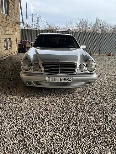 opel vectra b: Mercedes-Benz E 240: 2.4 l | 1997 il Sedan — 2