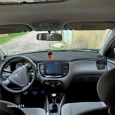 212 avtomobil: Kia Rio: 1.5 l | 2006 il Sedan — 4