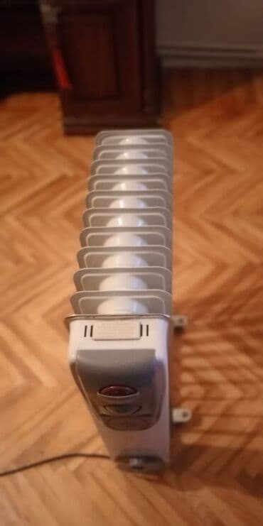 yag qizdirici: Bu radiator tipli qızdırıcı otaqların səmərəli və bərabər isidilməsi — 2