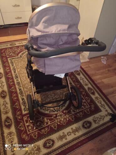 купить детские коляски: Bu uşaq arabası rahat və praktikdir. Qızılgül rəngindədir və müasir — 2