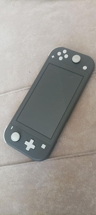 Nintendo Switch Lite Islek veziyyetdedir hec bir problemi yoxdur