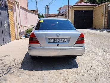 mercedes e class: Mercedes-Benz C-Sinfi (W202) sedan - Gümüşü rəng, 4 qapı, arxa — 4
