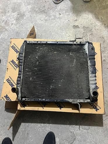 Radiatorlar: İsuzu npr 66 mstkalı maşının radiatorudur usdençıxmadır tamarginal dı — 1