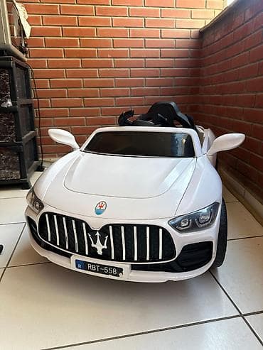 oyuncaq pultlu masin: Uşaq üçün elektrikli minik maşını – ağ rəng - Idman kupesi dizaynlı — 5
