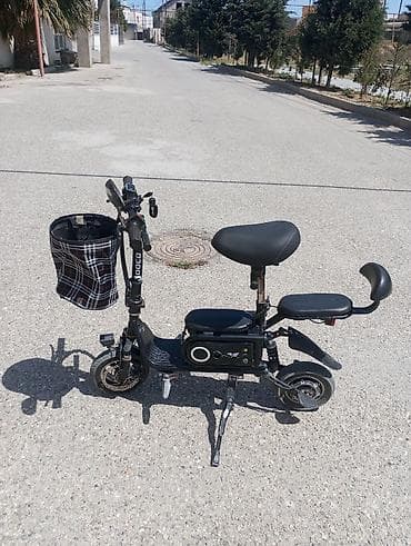 10 lt 663: Elektrikli skuter. 10 Ah. Tam doldurma ilə 20-25 km. Sürət təxminən 20 — 6