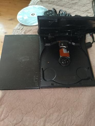 philips xenium 9@9v: PlayStation 2 Slim komplekt Dəst: - PS2 Slim konsolu (SCPH seriyası — 8