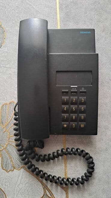 Stasionar telefon Simli