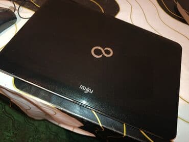 fujitsu notebook qiymetleri: Fujitsu noutbuk Xüsusiyyətlər: - Marka: Fujitsu - Korpusu qara — 4