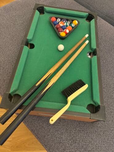 Настольный биллиард в очень хорошем состоянии. Размер 52 х 32 см. Все