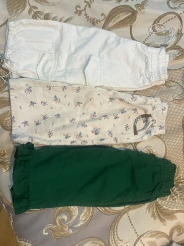 ust geyim: Uşaq geyimləri dəsti 1) Şalvarlar – 3 ədəd - Ağ şalvar: yanlarında — 1