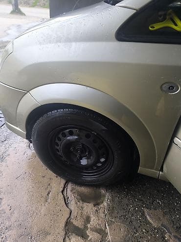 Opel: R15 4 bolt demir diskdi ancag barter edirem kraskasi normaldi cox — 1