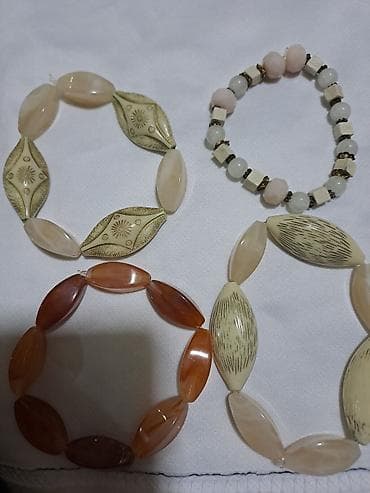 NÜXTELİF RENGDE FORMADA ÜSLUBDA GOLBAGLAR SEKİLDE GPSTETİLDİYİ KİMİ