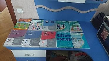 Coxlu muxtelif tipli kitablar satilir sekildeki destlerin biri 10 — 2