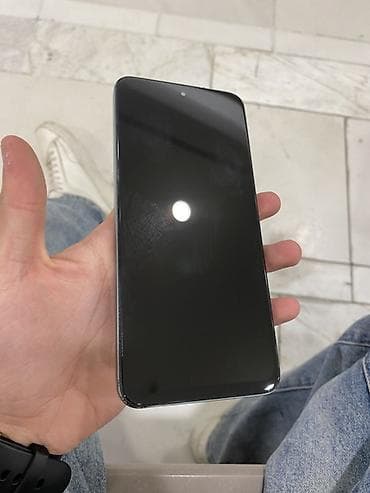 minik telefonlar: Məhsul: Yaşıl rəngli smartfon Xüsusiyyətlər və təsvir: - Korpus: Mat — 4