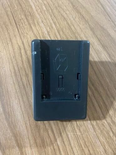 Fotokameralar: Məhsul: Batareya şarj cihazı (Model: DU01) Xüsusiyyətlər: - Giriş: AC — 1