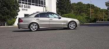 man tir: Mercedes-Benz E-Class: 2.7 l | 2003 il Sedan — 2