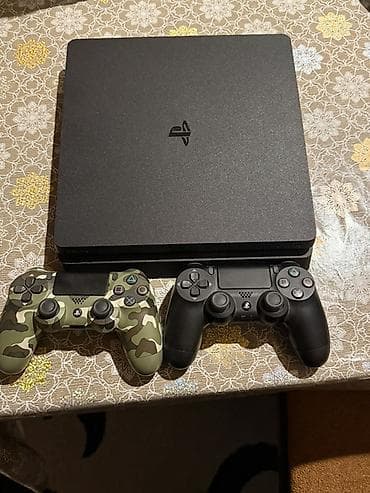 PlayStation 4 Slim 2 pult gta5 disk hediyye qiymetde razilasariq — 1
