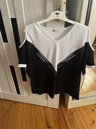pul kiseleri: Qara-ağ qadın bluzası - Model: qolu açıq kəsimli (cold-shoulder) — 1