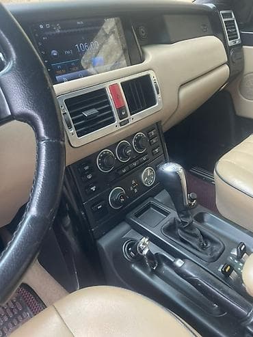 skorus basliqi: Range Rover (L322) – ağ rəngli, tam ölçülü premium SUV. Texniki və — 5
